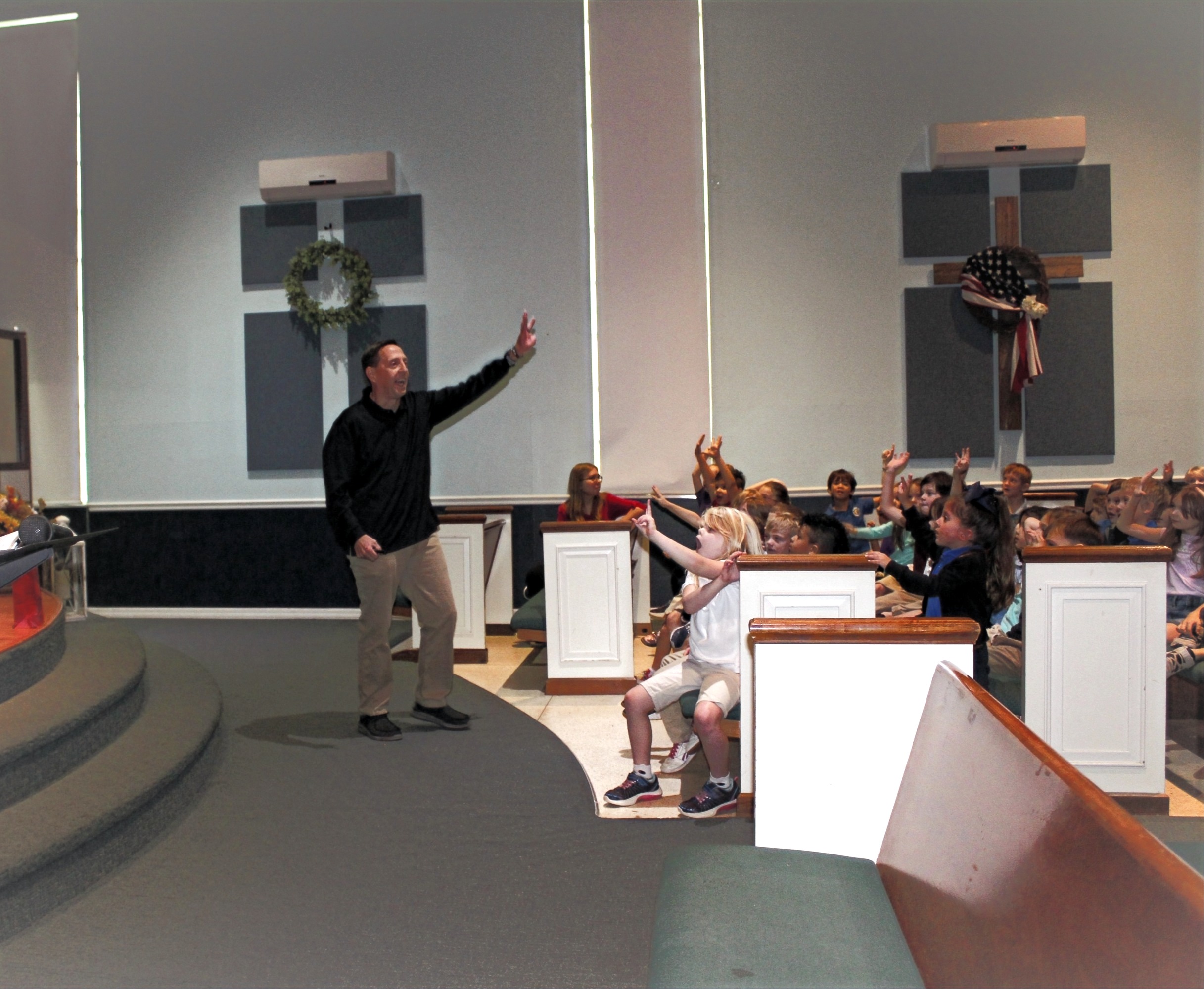 Teacher with students in church